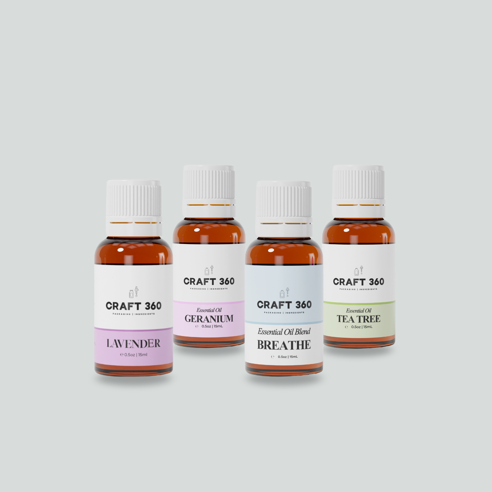 A collection of 4 bottles of Essential Oils from Craft 360. Lavender, Geranium, Breathe and Tea Tree.