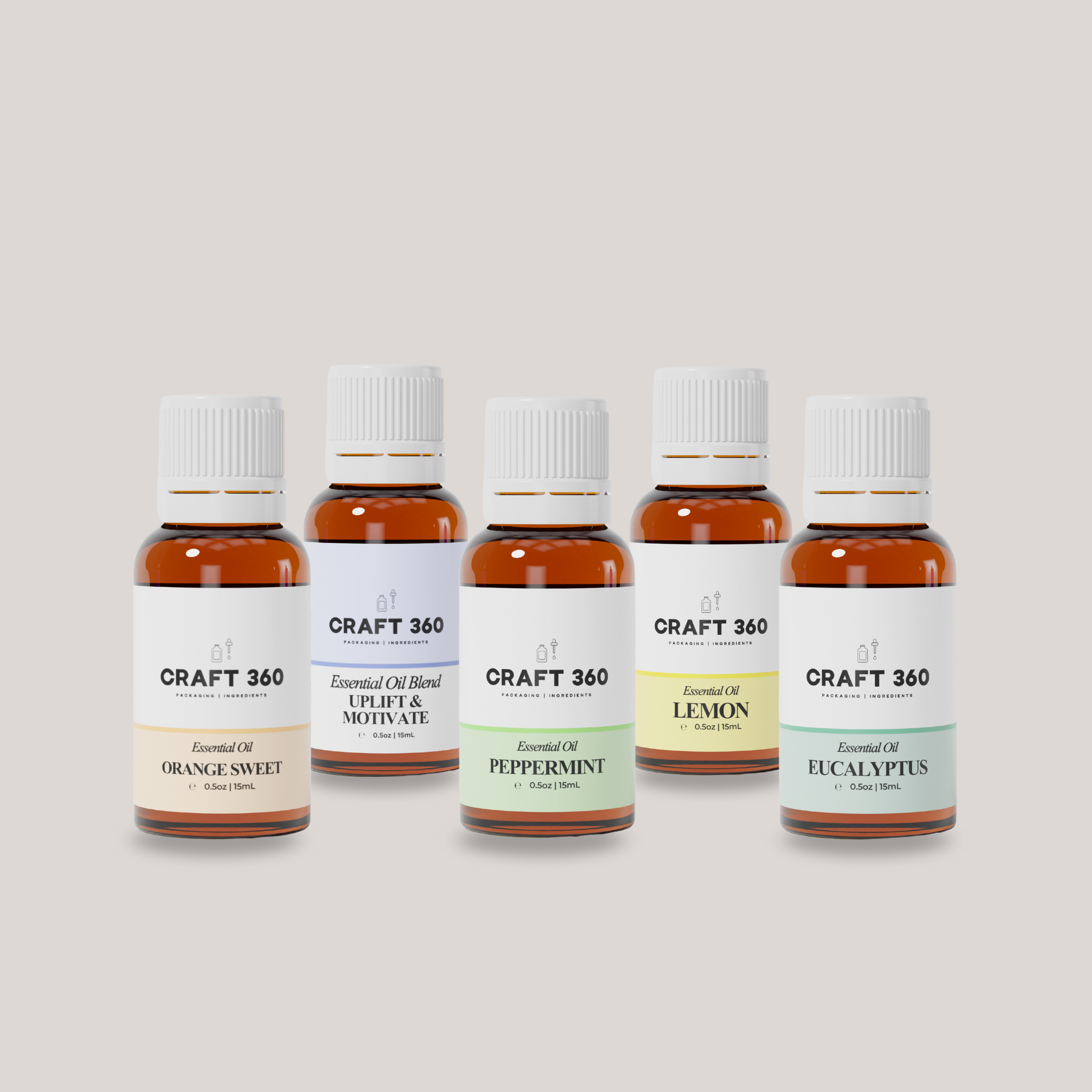A collection of 5 bottles of Essential Oils from Craft 360. Orange, Uplift & Motivate Blend, Peppermint, Lemon and Eucalyptus.