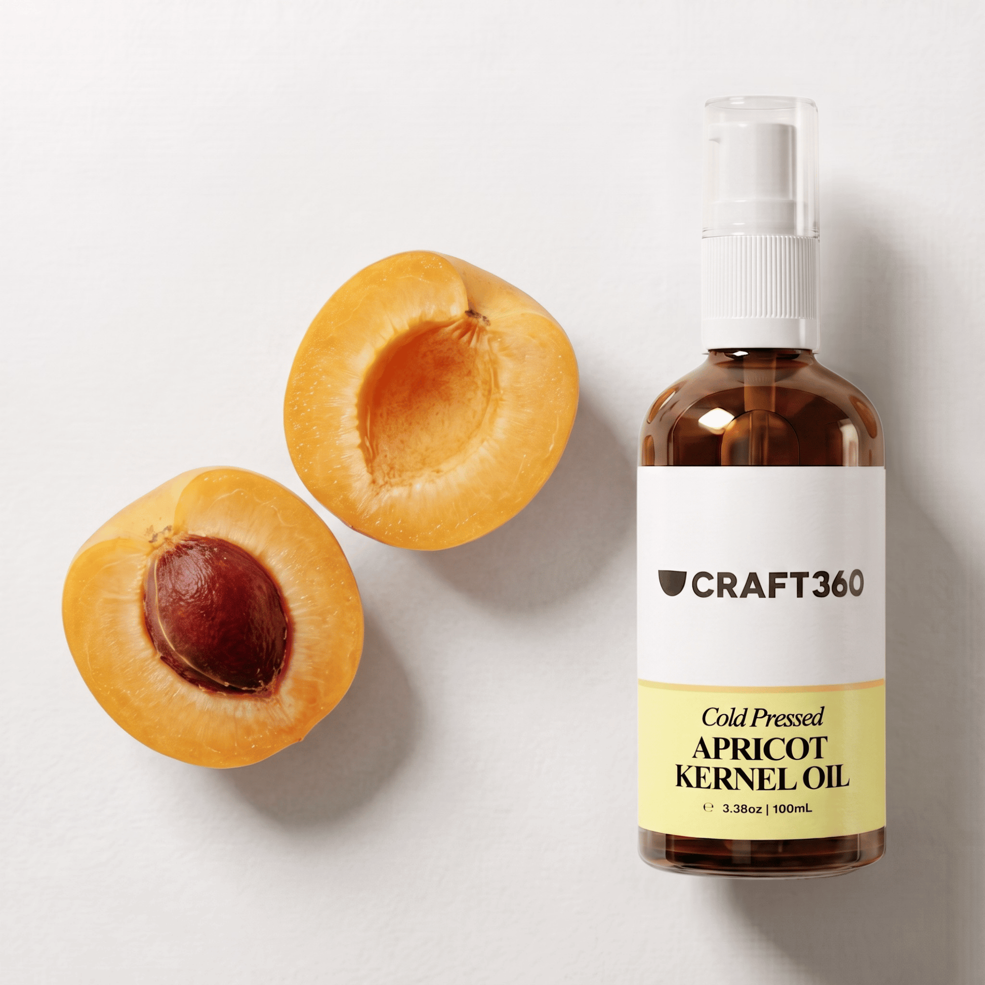 Apricot Kernel Oil displayed beside fresh apricots showing its natural botanical source