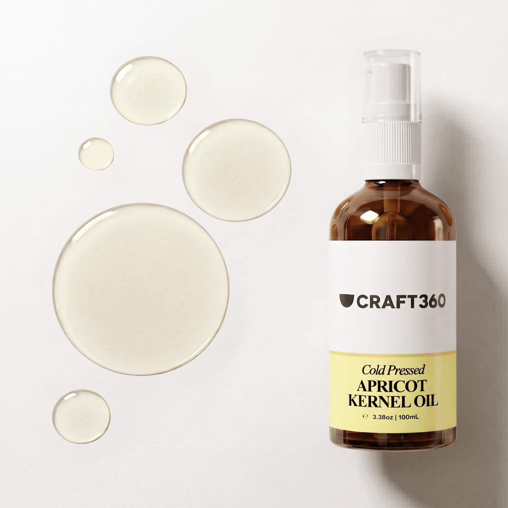 Apricot Kernel Oil in a Craft 360 amber glass pump bottle with oil droplets