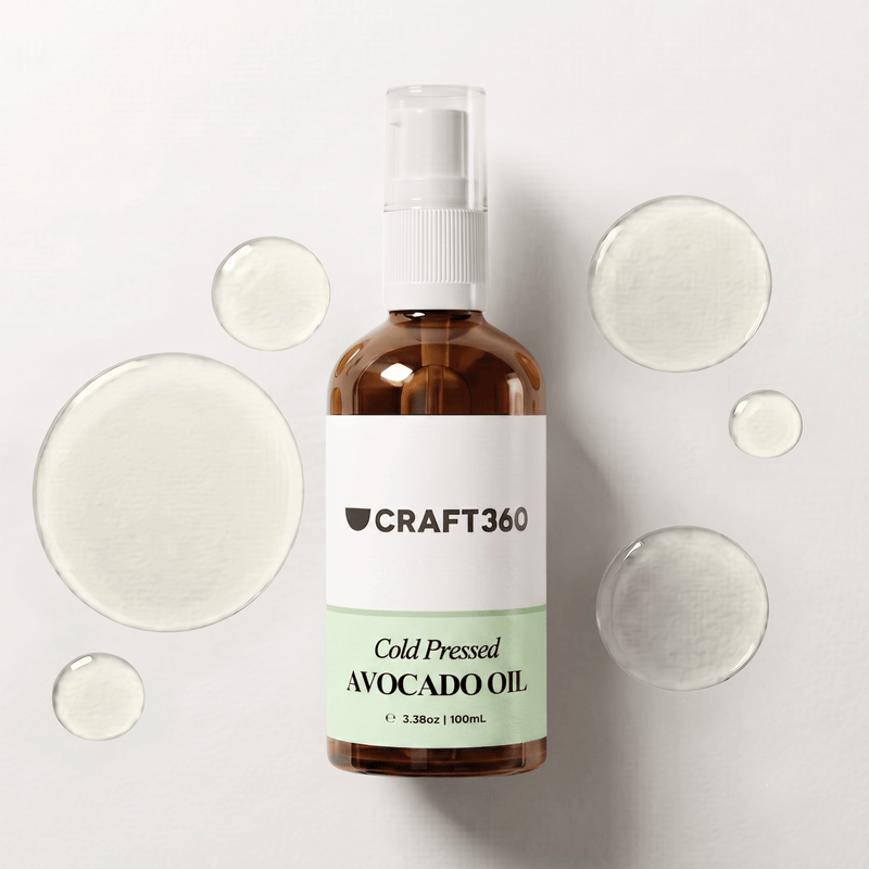 100 ml bottle of Avocado Oil surrounded by pools of natural carrier oil