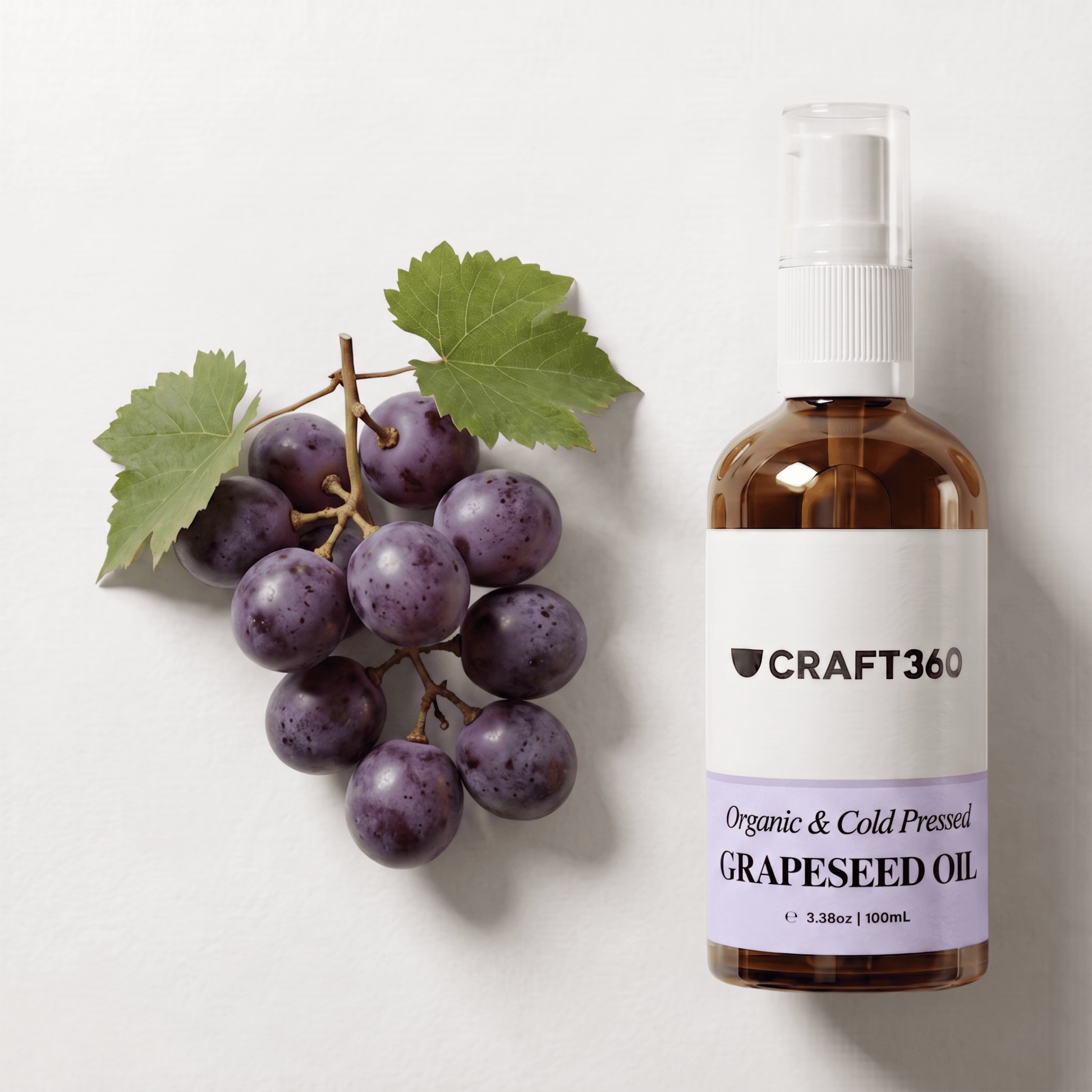 Certified Organic Grapeseed Oil displayed alongside grapes showing its natural botanical source